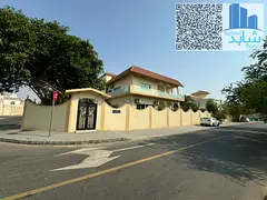 Stunning 6-Bedroom Corner Villa with Park Views in Al Nakheelat, Sharjah