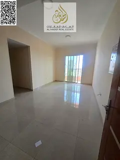 Two bedrooms, a living room, three bathrooms, a large master bedroom with a balcony in Al Rawda 1