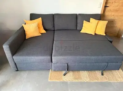 Cozy Grey L-Shaped Sofa with Yellow Accents