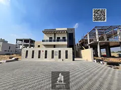 Villa for sale, registration fees included, next to the mosque, with a large internal yard, directly