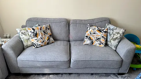 Comfortable Grey Sofa with Colorful Cushions