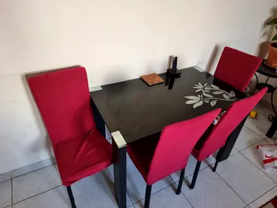Stylish Dining Table with Red Chairs