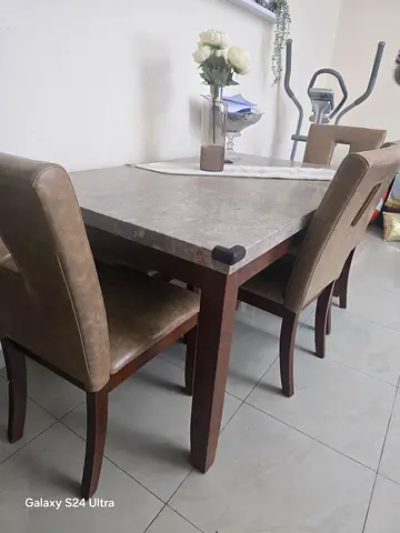 Elegant Dining Table with Stylish Chairs