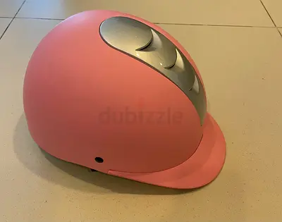 Horse riding pink helmet
