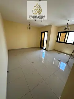 Two rooms and a hall for annual rent with built-in wardrobes in Al Naimiyah