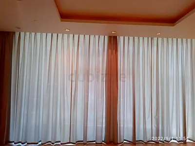 Elegant White Drapes for a Soft, Inviting Touch