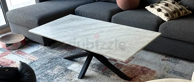 Elegant Marble Coffee Table with Sleek Black Legs