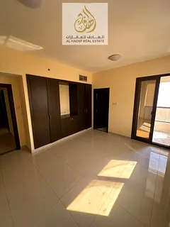 Two rooms and a living room with built-in wardrobes, annual rent in Al Nuaimiya 1