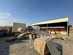 Warehouse for rent in al sajaa | Open yard
