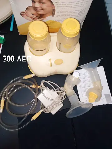 Medela Breast Pump with Accessories for Sale