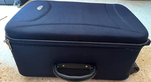Blue hard suitcase with 2 wheels