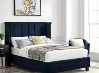 Elegant Navy Blue Bed Frame with Cozy Accessories