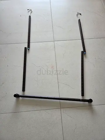 Sleek and Modern Clothes Rack extension. Adds a 2nd bar to your closet. Extra storage