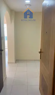 For Sale: Two-bedroom apartment with a living room in Al Taawun