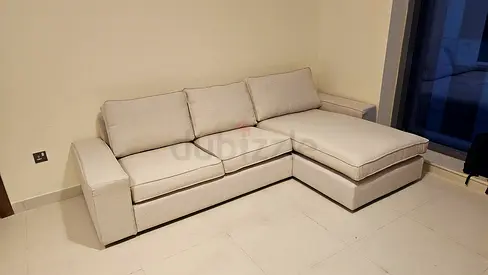 L shape beige Kivik sofa