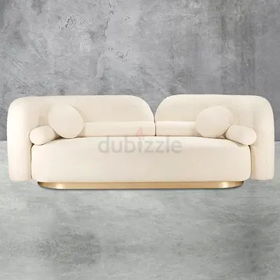 Elegant Cream Sofa with Round Accents