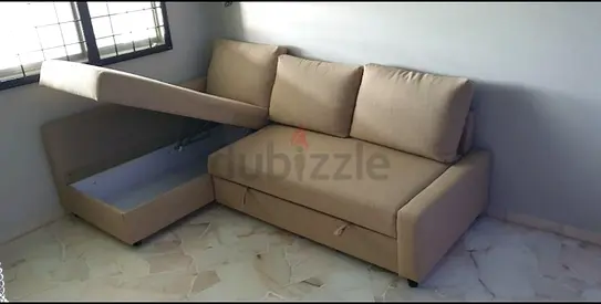 Compact and Versatile Sofa Bed with Storage