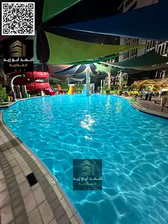 Elegant 2BHK in Al Rashidiya – luxury tower with gym, pool, aqua park, central A/C,