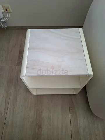 Sleek White Nightstand with Marble Finish
