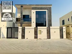 For sale in Al Amrah area, Ajman: a villa with 6 master bedrooms, a majlis, a living room, and a mai