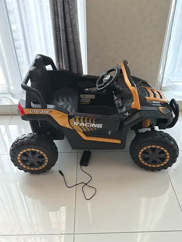 Kids Electric Ride-On Car - Off-Road Fun!