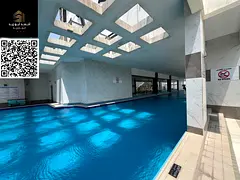 Luxury 2BR apartment in Ajman Rashidiya with gym, pool, aqua park, and premium facilities. Prime loc