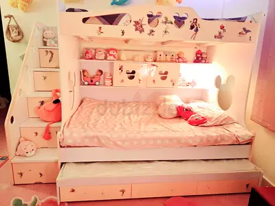 Charming fairytale-themed kids’ bunk bed with 5 rugs, a dressing table, 5 shelves, and a storage box
