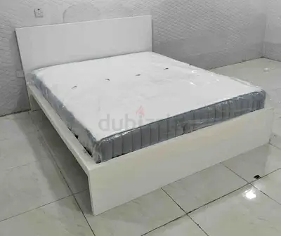 IKEA malam queen size 160/200 bed with IKEA mattress and 2 storage drawers underneath is available