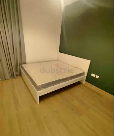 IKEA king‑size bed (180 × 200 cm) with ikea mattress