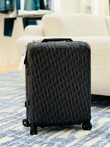 Rimowa and Dior cabin travel luggage bag