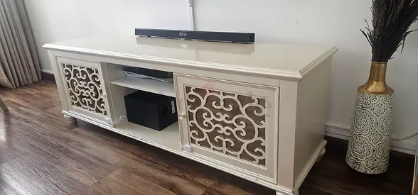 Elegant White Entertainment Center with Intricate Design