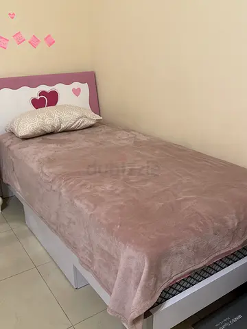 Cozy Bed with Heart Design Headboard