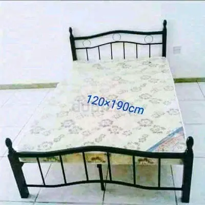 Wooden bed with mattress double size.  All times delivery available
