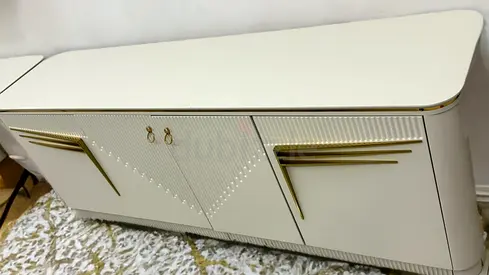 Elegant White Sideboard with Golden Accents
