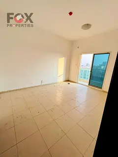 Two bedrooms and a living room for annual rent in City Towers, Al Nuaimiya. Parking and two bathroom