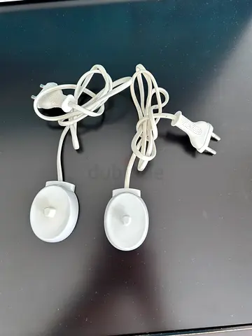 2 Oral B toothbrush chargers
