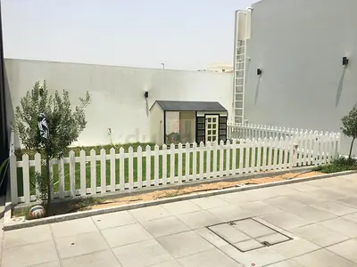 Pet house , Dog house , Cat house , Dog kennel with fence .