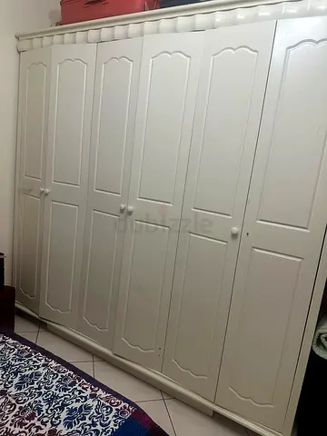 Elegant White Wardrobe with Ample Storage