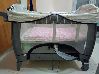 Baby crib for sale. With storage and easy to move. Prize can be negotiable