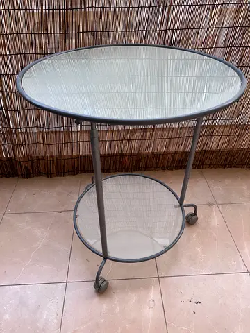 Round Glass Top Table with Rollers