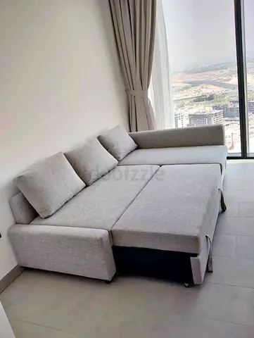 Comfortable Grey Sectional Sofa with Reclining Feature