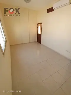 One bedroom and living room for rent outside Al Nuaimiya 2, College Street, central air conditioning