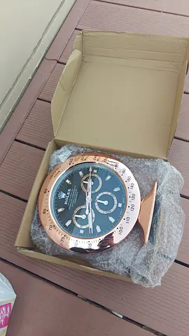 Wall clock Rolex