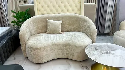 Elegant Curve-Shaped Sofa in Beige