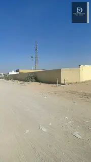 For sale in Sharjah, Al Sajaa area: A plot of land measuring 60,000 sq ft, divided into 3 plots, eac