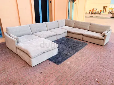 Selling feather 🪶 filled Homes r us U Shape Sofa with footstool