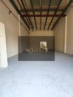 2000 sqft warehouse in Al Jurf Ind. 1 on main road, no mezzanine, 25 kW power, l —perfect location
