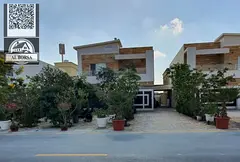 For rent: Residential/commercial villa in Al Muwaihat 1, consisting of 5 master bedrooms, a majlis (