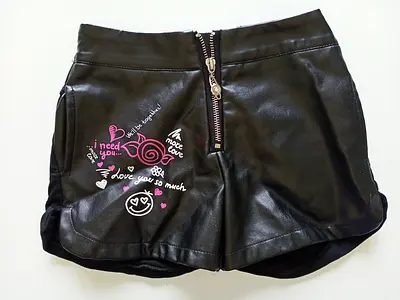 Girls faux leather shorts.