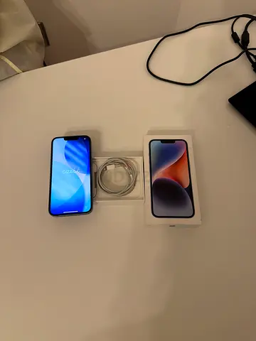 Apple iPhone 14 with Original Accessories 83% battery health and slight scratches